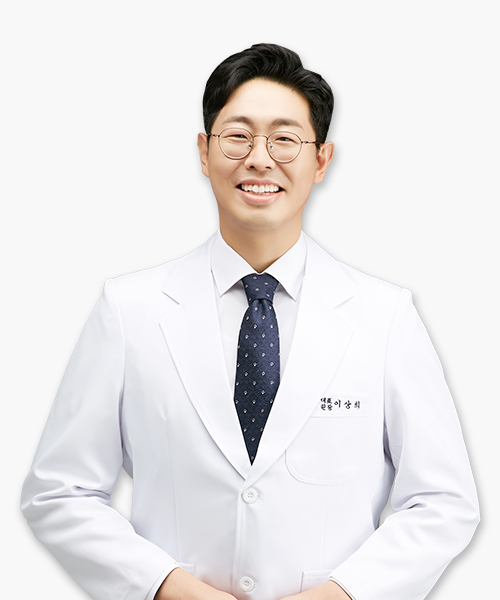 Sang-hee Lee, Chief Director of Digital Happeace Dental Clinic, smiling in a white coat and navy tie